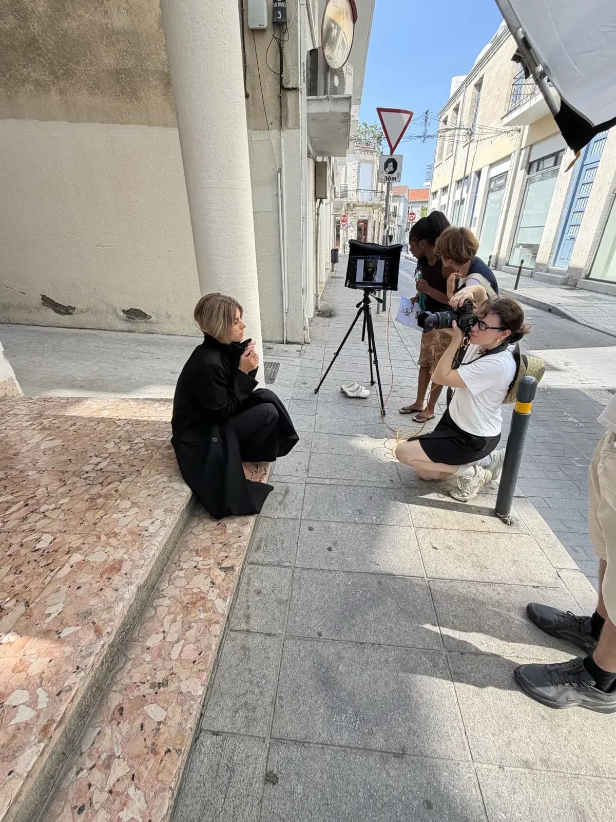 A seated portrait on the street